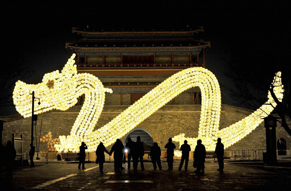 217623 visitors take pictures in front of a dragon shaped lantern which has b      